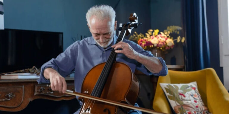 Guy Playing Cello Cover